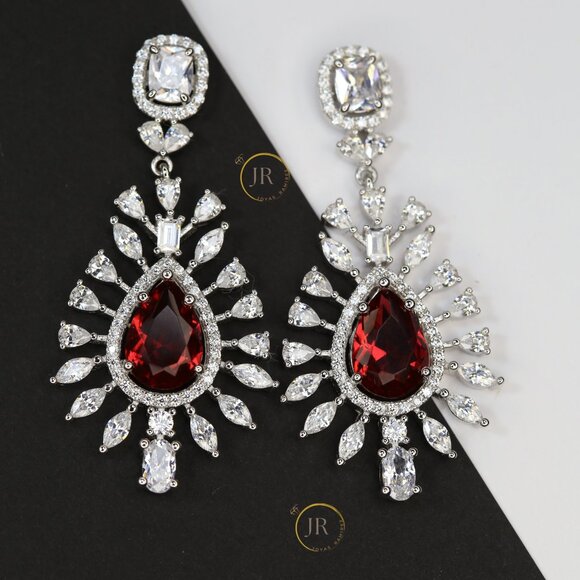 Joyas Ramirez Jewelry - Imperial Blossom .925 Silver Earrings · Ruby CZ · Elegant Floral Design.